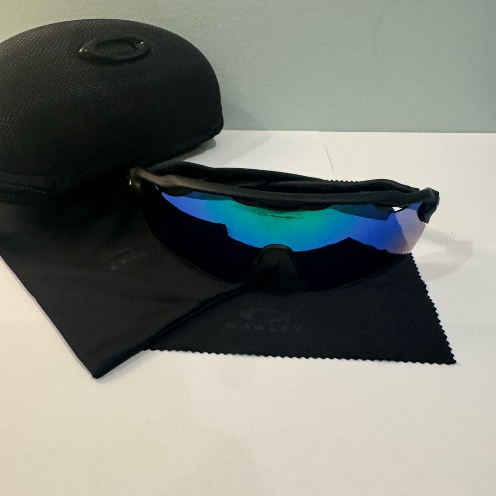 Oakley Black Sunglasses with Reflective Blue Lenses